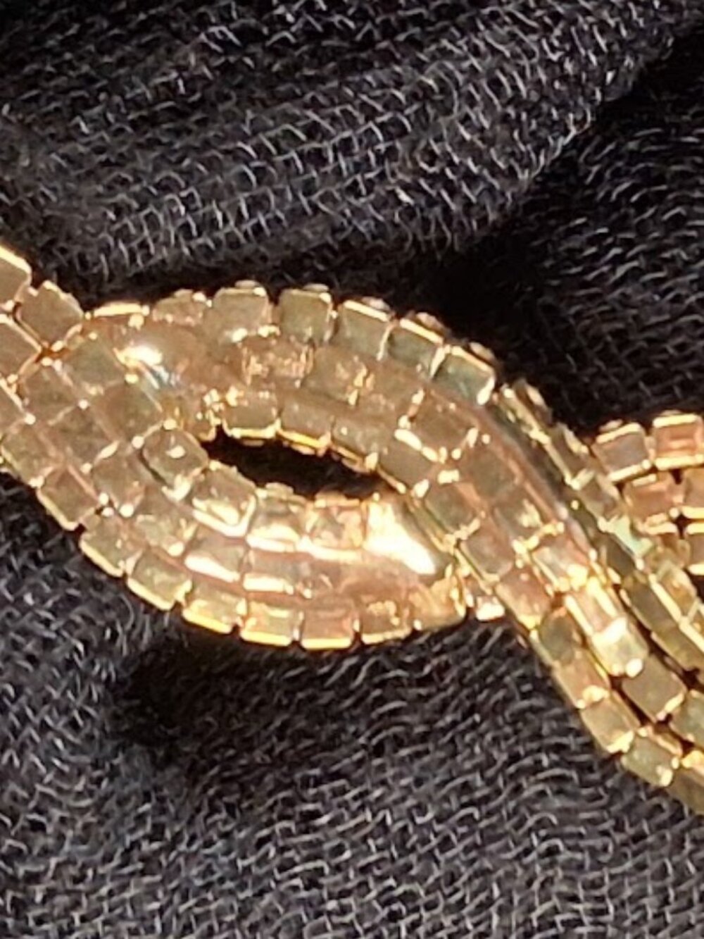 Gold-Tone Rhinestone Tassel Infinity Knot Necklace - Picture 5 of 11